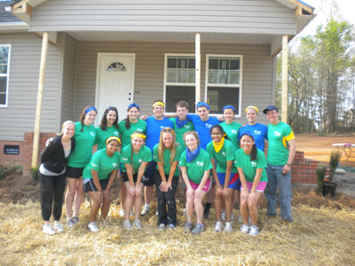 Drexel University's Honors Program ASB group in front of Habitat for Humanity home.